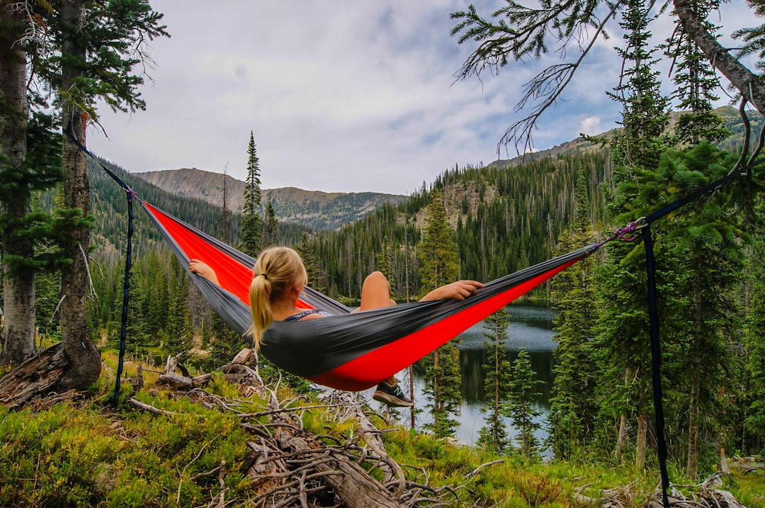 services-01 woman-on-hammock-near-to-river-kytt8l5jlds